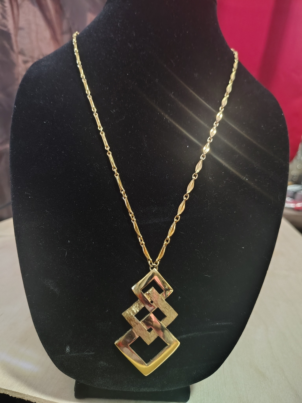 Monet Gold-Tone Interlocking Geometric Pendant Necklace